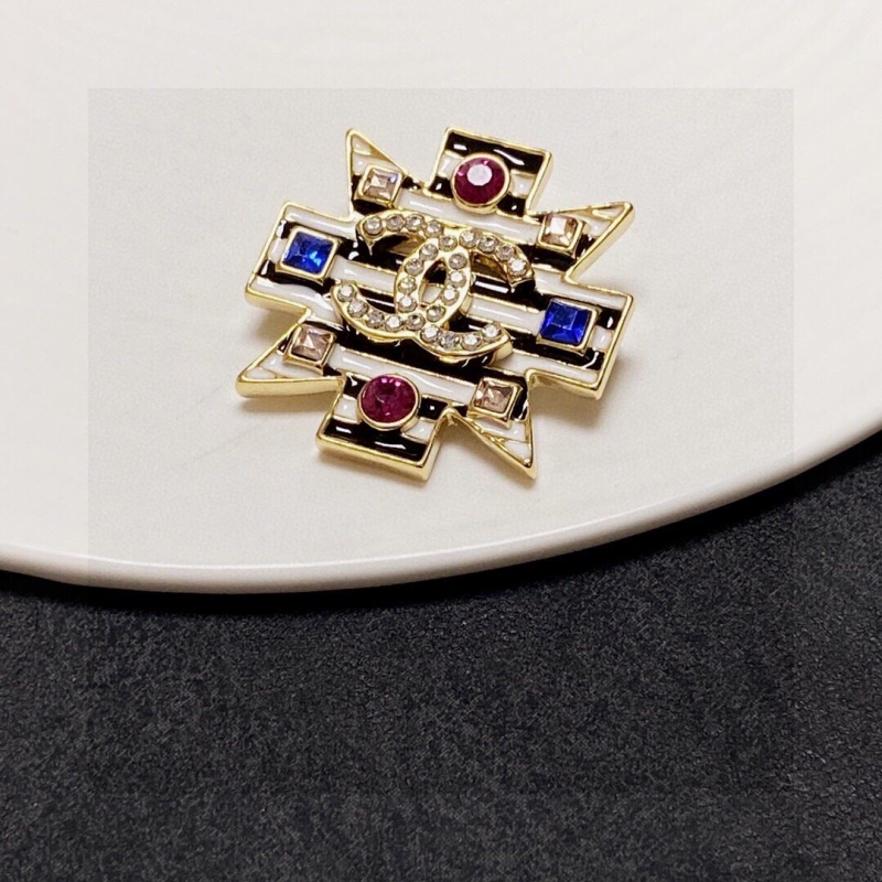 Ch*el brooches